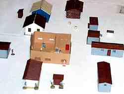 O-Scale buildings for model trains made an attractive battlefield.